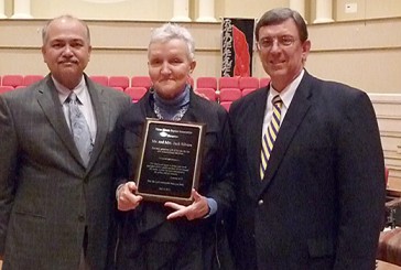Montie Silvers (center) receives a plaque of appreciation from directors of missions Randy Bradley (left) and Tom Capps. The donation of land for a new associational office by Silvers and her husband Jack was the catalyst for the creation of the new Three Rivers Baptist Association.