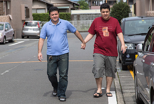 Brazilian missionary Luís Carlos Kakumu with son Filipe