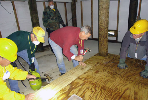 SCDR-Kershaw-Hurricane-Sandy_online South Carolina Baptist disaster relief volunteers help a New Jersey resident rebound from Hurricane Sandy in 2012.