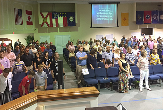 The worship center of Powdersville First Baptist Church in Easley displays flags from various countries to remind members of their international missions reach through the Cooperative Program and church mission trips.