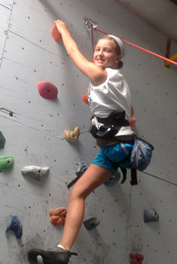 Climbing a rock wall.