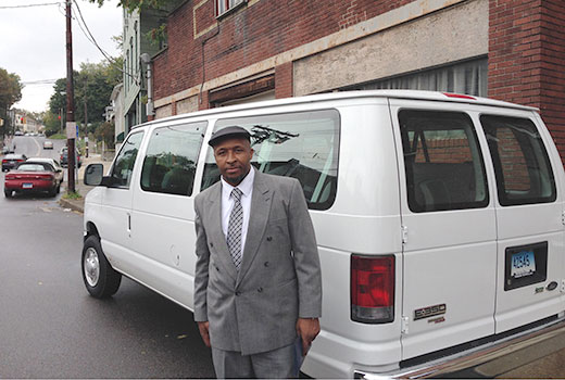 David Holland is a former drug dealer who now serves as the Cornerstone City Church’s community outreach organizer in Norwich, Conn. He drives the church van on Sundays, returning to former haunts to invite and drive people to church.