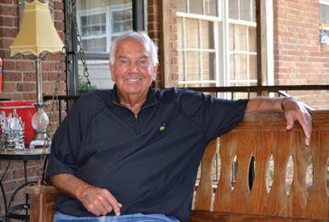 Richardson relaxing on his porch swing in Sumter.