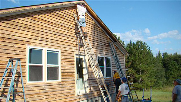 Campers on Mission help rebuild from fire
